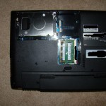 Samsung Q460 RAM and hard drive shown with access panel removed.